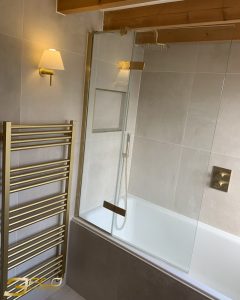 bathroom remodel gold appliances natural wood led mirror